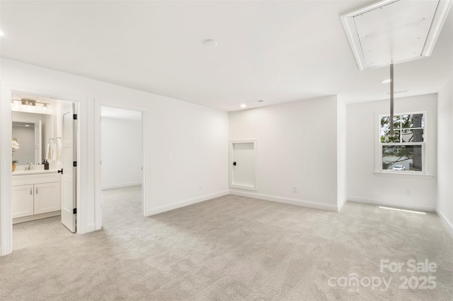 3222 Player Ct, Salisbury, NC 28144 - spare room featuring attic access, light carpet, and recessed lighting