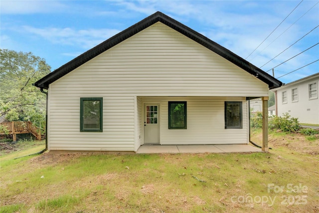 452 Duncan St, Spartanburg, SC 29306 - rear view of property featuring a yard and a patio area