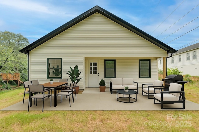 452 Duncan St, Spartanburg, SC 29306 - rear view of house with a patio area, an outdoor hangout area, and a yard