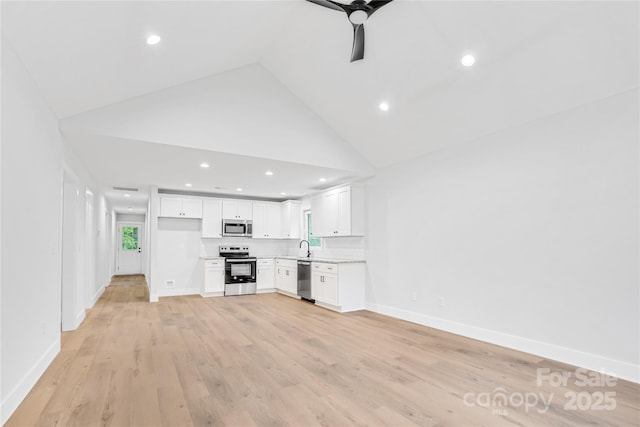 452 Duncan St, Spartanburg, SC 29306 - unfurnished living room featuring a ceiling fan, light wood-style flooring, high vaulted ceiling, and recessed lighting