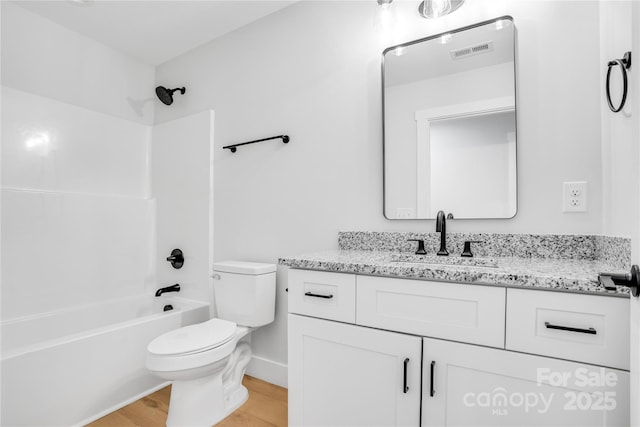 452 Duncan St, Spartanburg, SC 29306 - bathroom featuring vanity, wood finished floors, and shower / bathtub combination