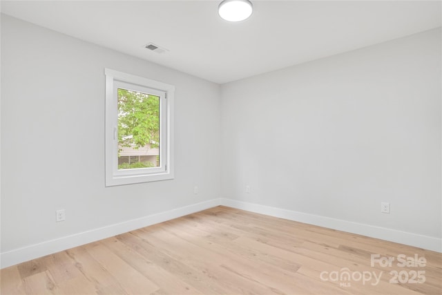 452 Duncan St, Spartanburg, SC 29306 - empty room with baseboards and light wood-style flooring