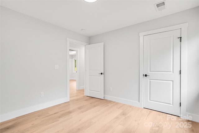 452 Duncan St, Spartanburg, SC 29306 - unfurnished bedroom featuring wood finished floors and baseboards