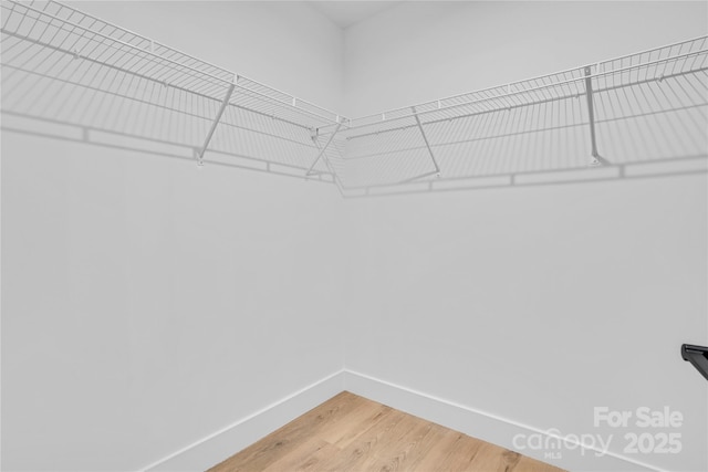 452 Duncan St, Spartanburg, SC 29306 - spacious closet featuring light wood-type flooring