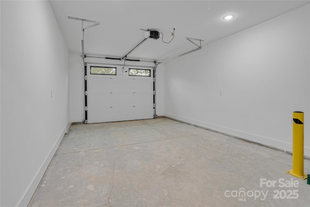 452 Duncan St, Spartanburg, SC 29306 - garage featuring a garage door opener and baseboards