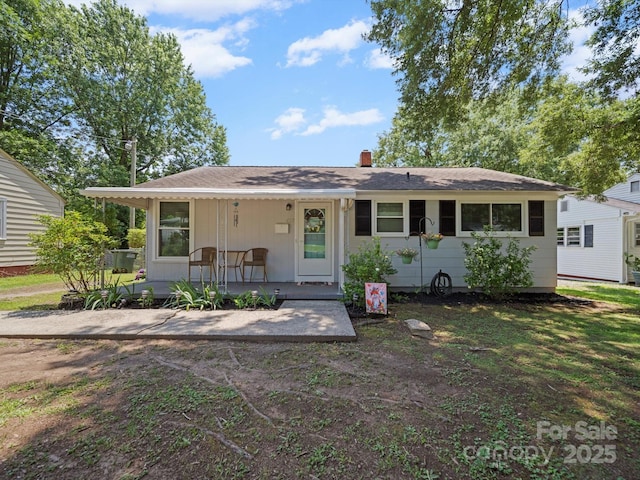 427 E 12th Ave, Gastonia, NC 28054 - view of front of home featuring a chimney and covered porch
