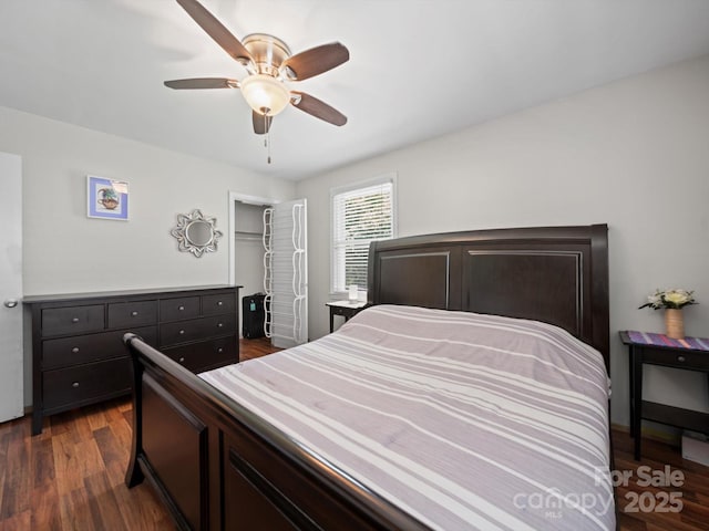 427 E 12th Ave, Gastonia, NC 28054 - bedroom featuring dark wood finished floors, a closet, and a ceiling fan