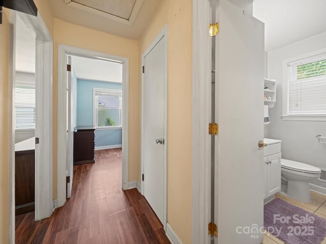 427 E 12th Ave, Gastonia, NC 28054 - corridor featuring dark wood-type flooring and baseboards