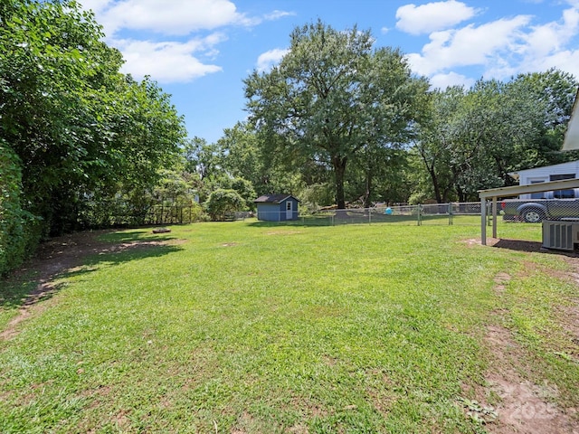 427 E 12th Ave, Gastonia, NC 28054 - fenced backyard featuring view of wooded area