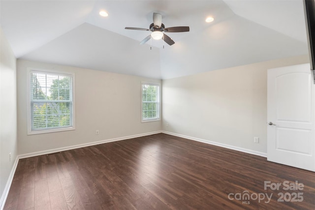 7627 Sarah Dr, Denver, NC 28037 - spare room with vaulted ceiling, healthy amount of natural light, dark wood-style flooring, ceiling fan, and recessed lighting