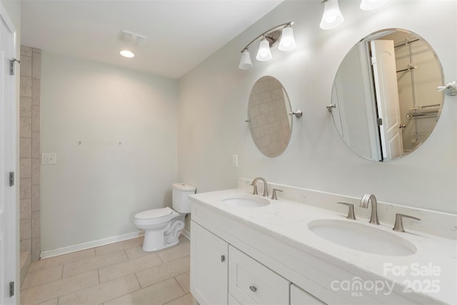 7627 Sarah Dr, Denver, NC 28037 - bathroom featuring double vanity and tile patterned flooring