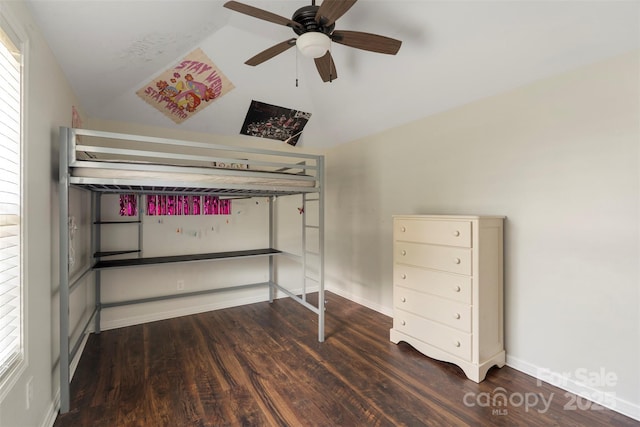 7627 Sarah Dr, Denver, NC 28037 - bedroom featuring vaulted ceiling, wood finished floors, multiple windows, and ceiling fan