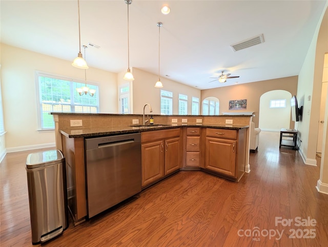 408 Presidio Dr, Rock Hill, SC 29732 - kitchen featuring stainless steel dishwasher, ceiling fan, wood finished floors, and dark stone counters