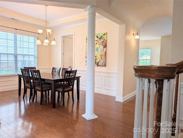 408 Presidio Dr, Rock Hill, SC 29732 - dining space featuring dark wood finished floors, ornamental molding, a chandelier, wainscoting, and a decorative wall
