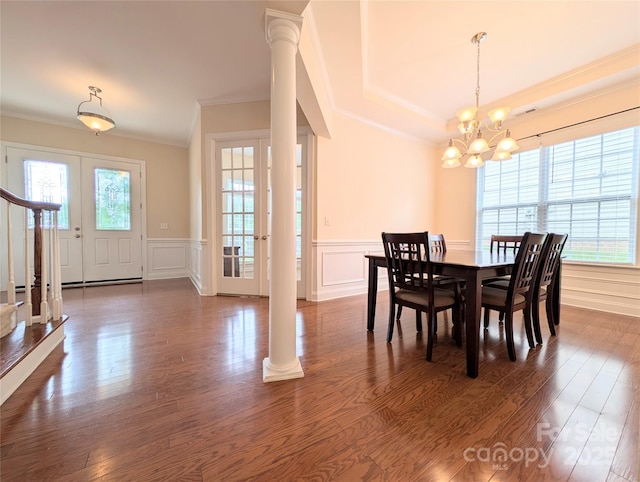 408 Presidio Dr, Rock Hill, SC 29732 - dining area with crown molding, a decorative wall, a chandelier, dark wood-style floors, and decorative columns