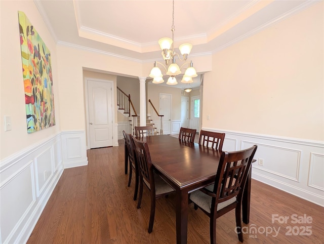 408 Presidio Dr, Rock Hill, SC 29732 - dining space with a decorative wall, a chandelier, stairway, a tray ceiling, and crown molding