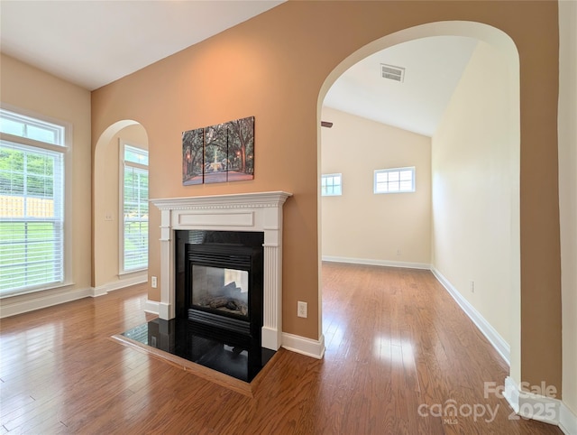 408 Presidio Dr, Rock Hill, SC 29732 - detailed view of wood finished floors, a multi sided fireplace, and arched walkways