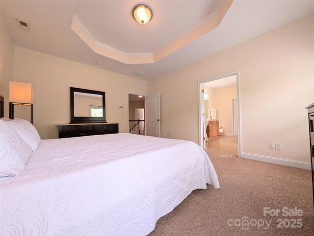 408 Presidio Dr, Rock Hill, SC 29732 - bedroom featuring a raised ceiling, ornamental molding, light carpet, and ensuite bath