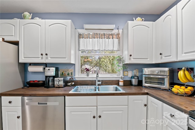 4 Orchard Pl, Weaverville, NC 28787 - kitchen with appliances with stainless steel finishes, butcher block counters, and white cabinets