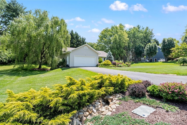 4 Orchard Pl, Weaverville, NC 28787 - view of green lawn featuring an attached garage and driveway