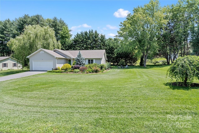 4 Orchard Pl, Weaverville, NC 28787 - view of front facade with a garage, a front yard, asphalt driveway, and view of scattered trees