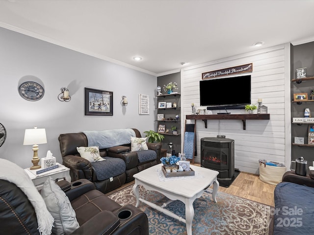 142 Hickory Rd, Lexington, NC 27292 - living area with crown molding, wood finished floors, recessed lighting, and a wood stove