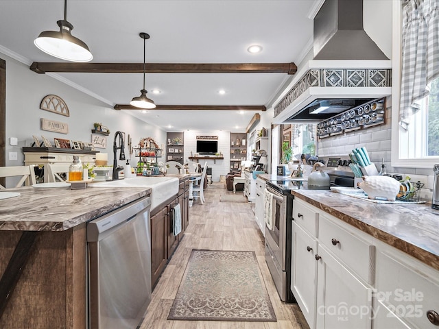 142 Hickory Rd, Lexington, NC 27292 - kitchen with appliances with stainless steel finishes, custom exhaust hood, beam ceiling, healthy amount of natural light, and light wood-type flooring