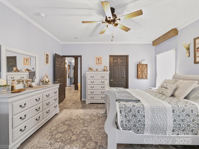 142 Hickory Rd, Lexington, NC 27292 - bedroom with crown molding, light wood-type flooring, and ceiling fan
