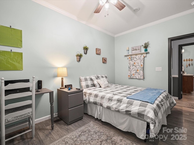 142 Hickory Rd, Lexington, NC 27292 - bedroom with wood finished floors, crown molding, and ceiling fan