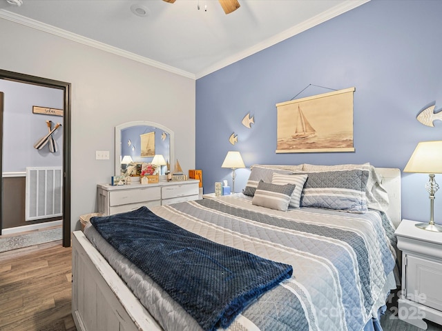 142 Hickory Rd, Lexington, NC 27292 - bedroom featuring crown molding, wood finished floors, and a ceiling fan