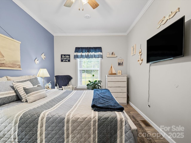 142 Hickory Rd, Lexington, NC 27292 - bedroom with wood finished floors, ornamental molding, and ceiling fan