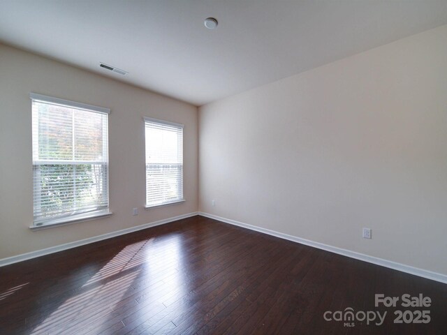 3009 Palm Dr, Fort Mill, SC 29715 - spare room with dark wood-style floors and baseboards