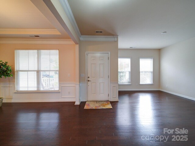3009 Palm Dr, Fort Mill, SC 29715 - foyer entrance with a wainscoted wall, crown molding, and dark wood finished floors