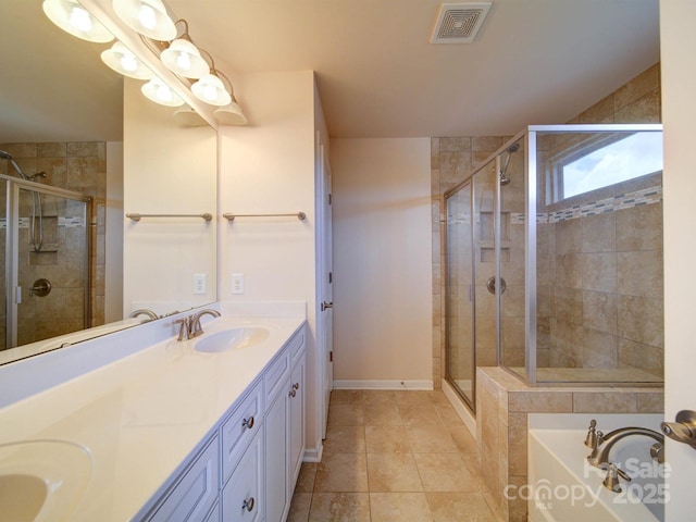 3009 Palm Dr, Fort Mill, SC 29715 - bathroom with a stall shower, a bath, double vanity, and tile patterned flooring
