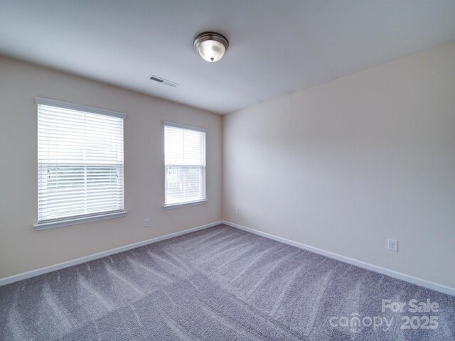 3009 Palm Dr, Fort Mill, SC 29715 - unfurnished room featuring carpet flooring and baseboards