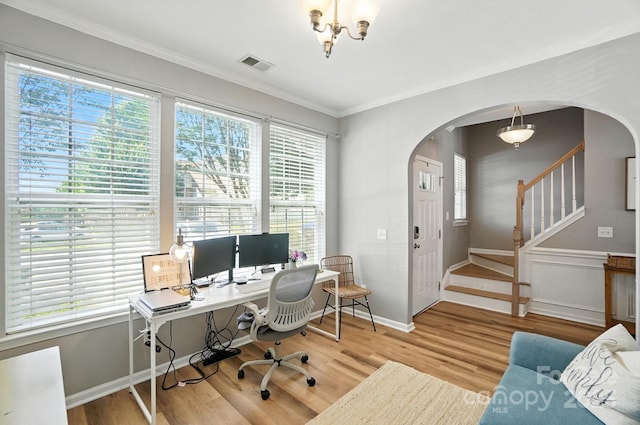 529 River Park Rd, Belmont, NC 28012 - office area with arched walkways, wood finished floors, ornamental molding, and a chandelier