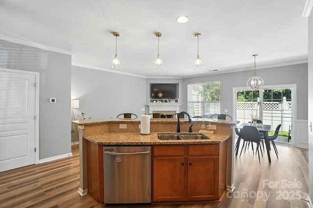 529 River Park Rd, Belmont, NC 28012 - kitchen with stainless steel dishwasher, wood finished floors, ornamental molding, light stone countertops, and an island with sink