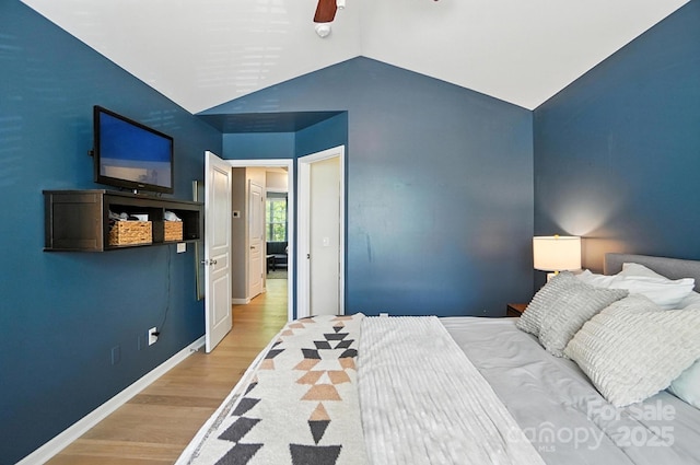 529 River Park Rd, Belmont, NC 28012 - bedroom with wood finished floors, vaulted ceiling, and a ceiling fan