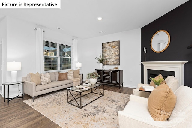 1357 Secrest Commons Dr, Monroe, NC 28112 - living area with wood finished floors, recessed lighting, and a fireplace