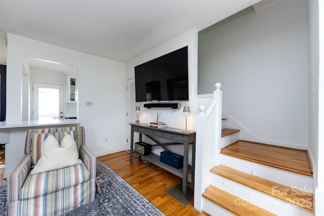 528 Wakefield Dr Unit A, Charlotte, NC 28209 - living area featuring wood finished floors and stairway