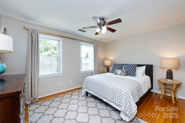 528 Wakefield Dr Unit A, Charlotte, NC 28209 - bedroom with wood finished floors and ceiling fan