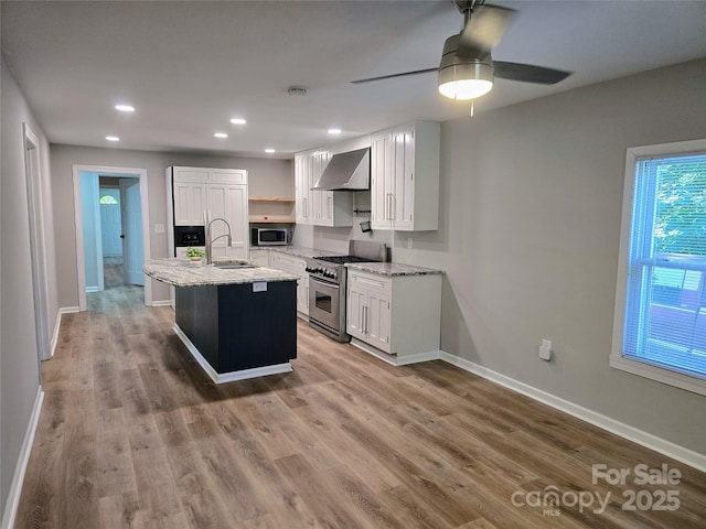 616 Laurel St, Albemarle, NC 28001 - kitchen featuring stainless steel appliances, wall chimney range hood, open shelves, white cabinets, and recessed lighting