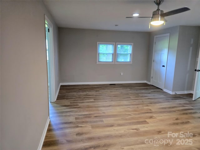 616 Laurel St, Albemarle, NC 28001 - unfurnished room featuring wood finished floors, a ceiling fan, and recessed lighting