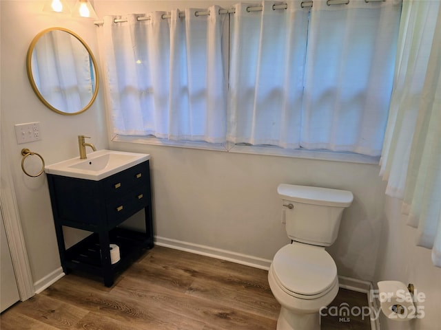 616 Laurel St, Albemarle, NC 28001 - bathroom with vanity and wood finished floors