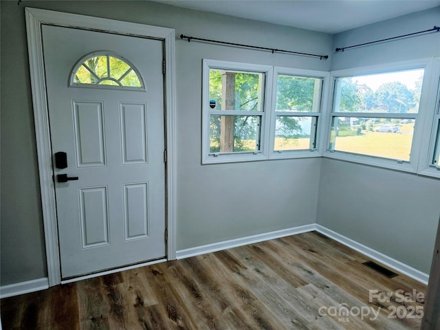616 Laurel St, Albemarle, NC 28001 - foyer featuring baseboards and wood finished floors
