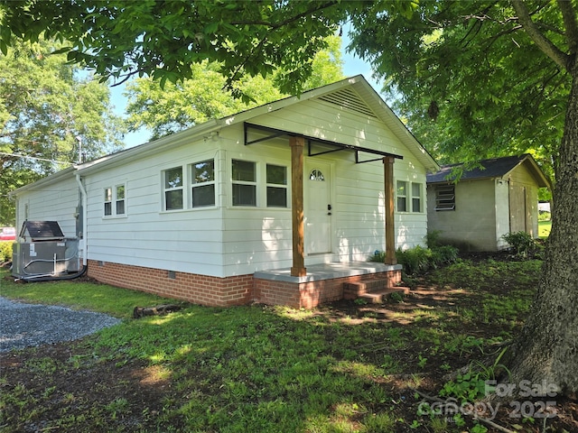 616 Laurel St, Albemarle, NC 28001 - view of front of house featuring an outbuilding and crawl space