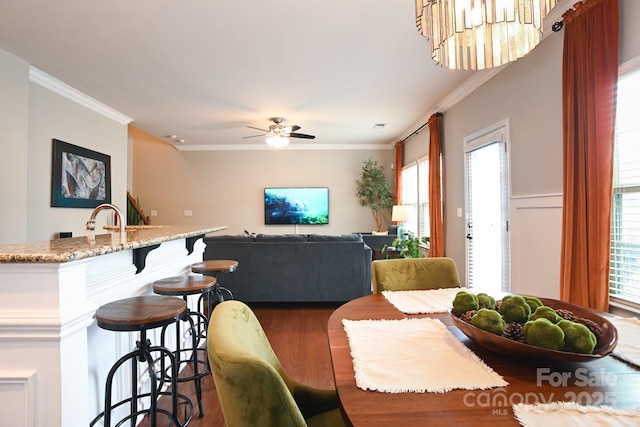 3537 Hornets Nest Way Unit 206, Charlotte, NC 28208 - dining space with wood finished floors, crown molding, and a ceiling fan
