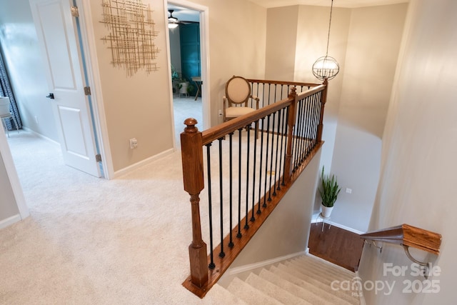3537 Hornets Nest Way Unit 206, Charlotte, NC 28208 - stairs featuring a chandelier, carpet flooring, and ceiling fan