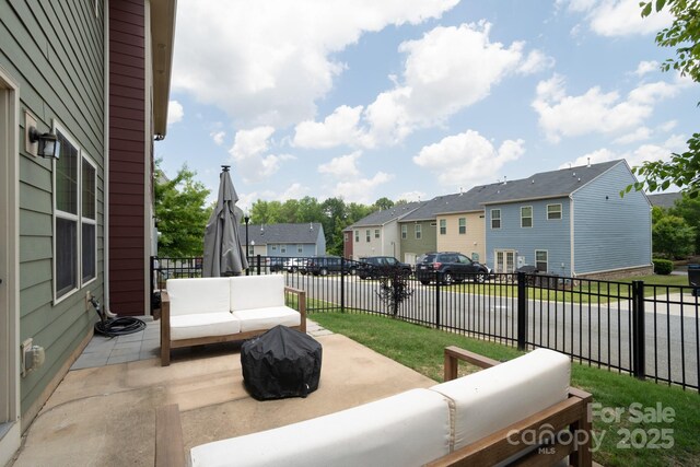 3537 Hornets Nest Way Unit 206, Charlotte, NC 28208 - view of patio featuring a residential view and outdoor lounge area