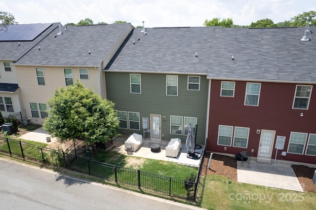 3537 Hornets Nest Way Unit 206, Charlotte, NC 28208 - rear view of house with a patio area, entry steps, and a fenced backyard